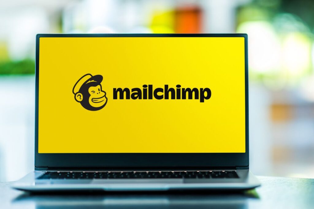 Laptop computer displaying logo of Mailchimp, an American marketing automation platform and email marketing service.