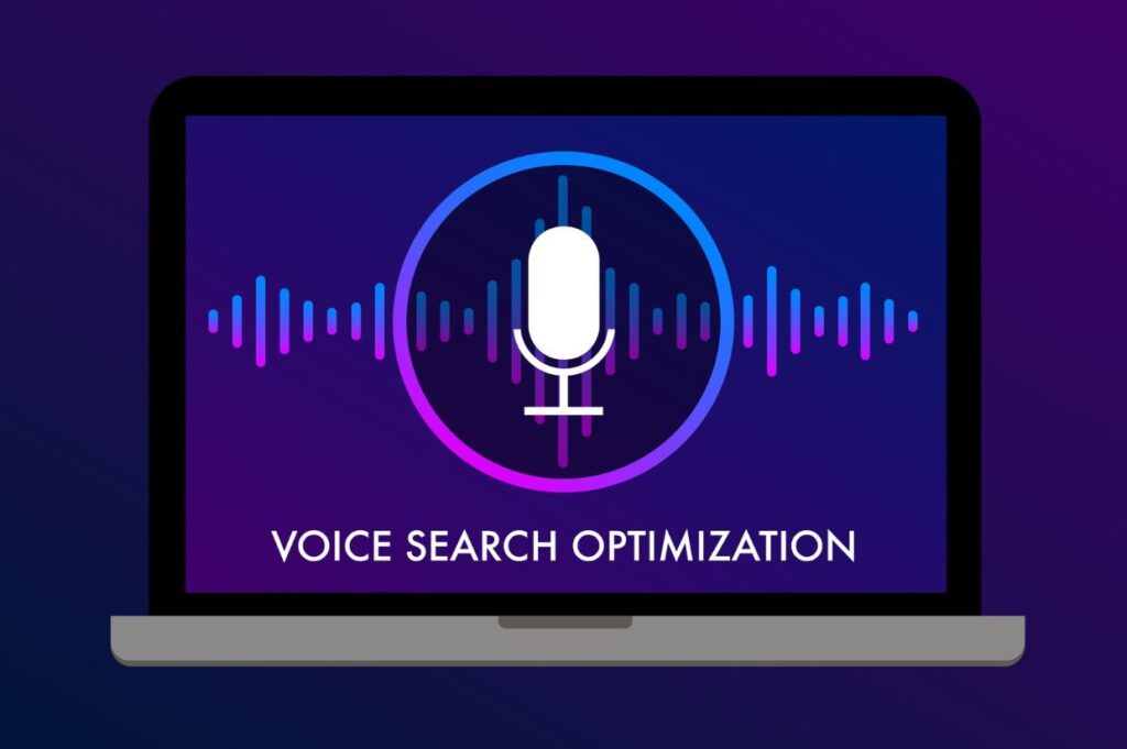 Illustration of a laptop screen displaying a microphone icon within a circular outline, surrounded by soundwave graphics in gradient shades of purple, blue, and pink. Below the icon, the text reads 'Voice Search Optimization' on a dark purple background.